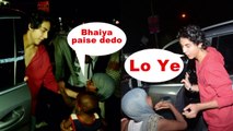 Shahrukh Khan Son Aryan Khan Gives Money To A Begger While Leaving A Party