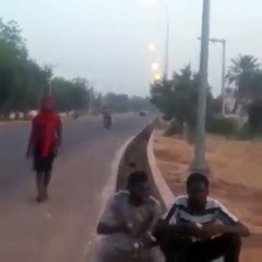 three boys fell down in a gutter because of a girl