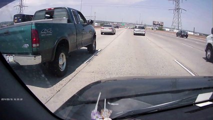 Green Truck Road Rages Across Lanes