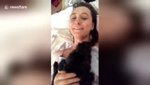 Woman has breast fondled by dog at exact moment she sings raunchy line from Ariana Grande song