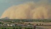 Steep Wall of Dust Sweeps Over Southern Arizona, Envelops Mountain