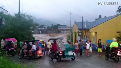 Heavy Rain Turns Road Into Raging River