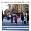 Little Basketball Player Passes A Lady At The Middle-Street