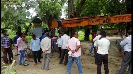 Bull rescued from 35-foot well by farmers using crane in India