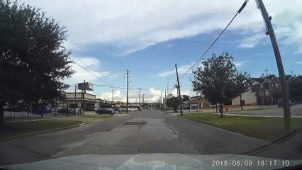 Wild Driver Swerves into Parked Car
