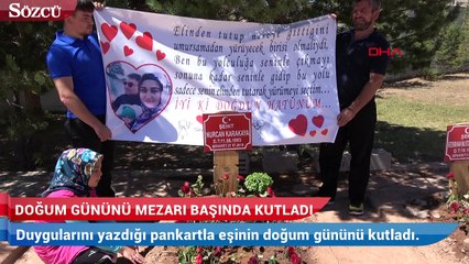 下载视频: 10 aylık oğluyla şehit olan eşinin doğum gününü, mezarı başında kutladı