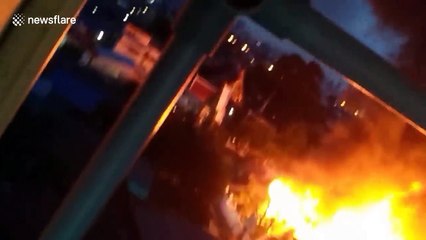 Fire destroys 16 antique wooden homes in Bangkok