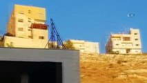 - Ürdün'de güvenlik güçlerinin teröristlere düzenlediği baskın sırasında bir bina çöktü