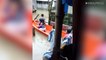 Children Use Boat After Rain Flooded Their Homes