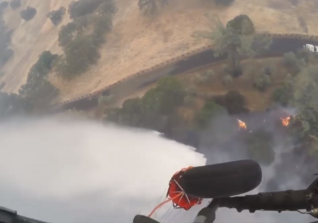 Firefighting Helicopter Uses Water Drop to Control Mendocino Complex