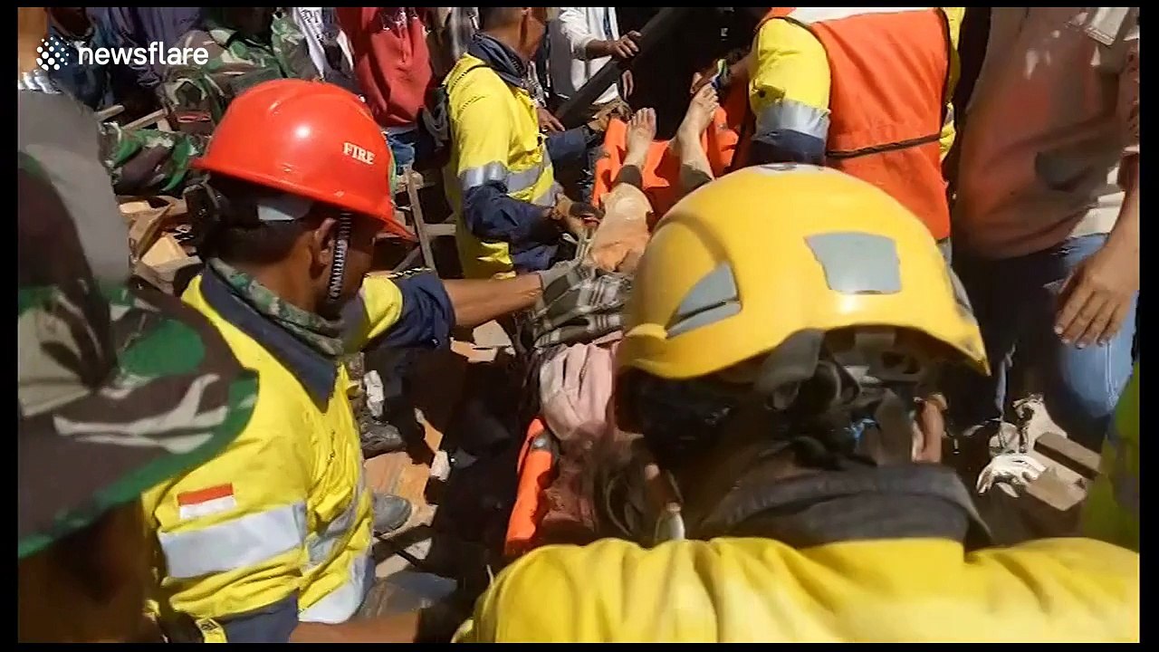Dramatic moment high-school student pulled from rubble three days after Indonesia quake