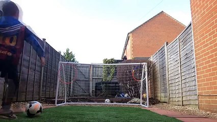 5 year old practices his free kick skills