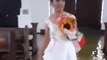 Bride Wades Through Flooded Church Aisle in Aftermath of Monsoon