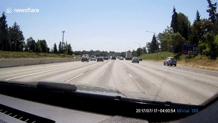 Car spins out of control after making late turn-off on US highway