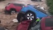 Flood Waters Sweep Away Cars From New Jersey Dealership