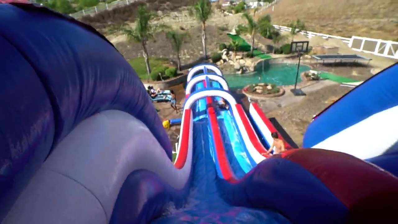 GIANT BACKYARD WATERSLIDE INTO 1,000 POUNDS OF DRY ICE!