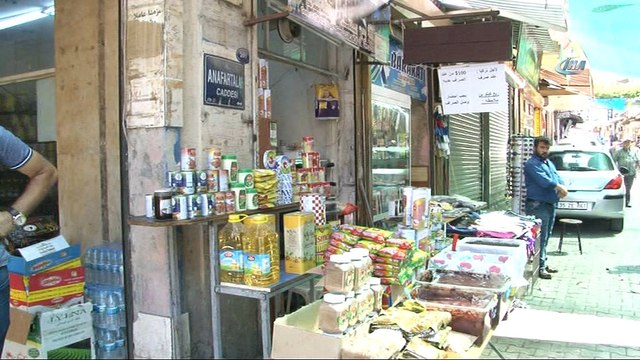 Suriyeli esnaftan döviz bozdurma kampanyası