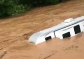Camper Floats Down Flooded Pennsylvania Creek