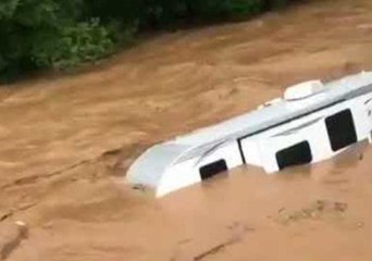 Camper Floats Down Flooded Pennsylvania Creek