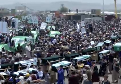 Funeral Parade Carries Coffins of Children Killed in Bus Attack