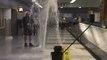 Excess Rainwater Bursts From Ground Near Baggage Claim at New York's JFK Airport