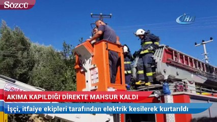 Elektrik işçisi akıma kapıldığı direkte mahsur kaldı