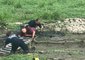 Illinois Firefighters Rescue Man Stuck in Mud While Parrot Perched on His Shoulder Watches