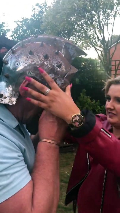 Lad gets Gladiator s helmet stuck on his head