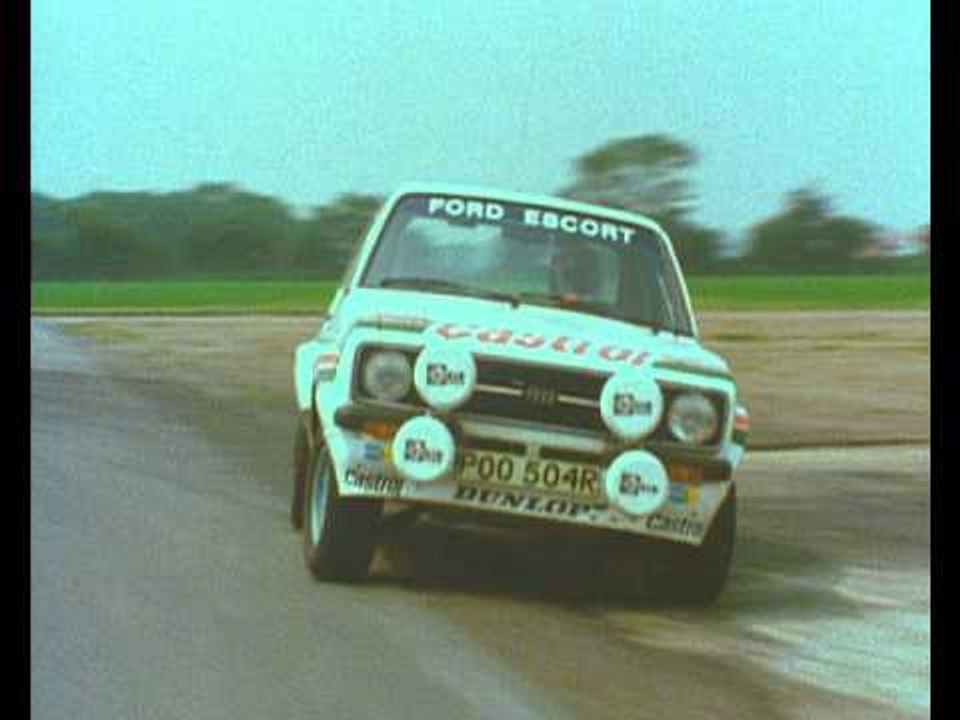 Sir Jackie Stewart drives a Ford Escort RS1800 Rally Car