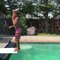 Kid Faceplants Diving Board While Backflipping Into Pool