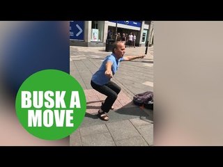 A random stranger busts a move to busker who jams Ed Sheeran with a saxophone