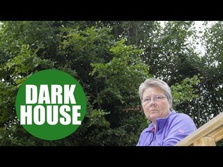A woman says she's living in darkness because of a 42ft tree behind her home