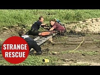 Firefighters rescue man and his parrot who had sunken into mud like ‘quicksand’
