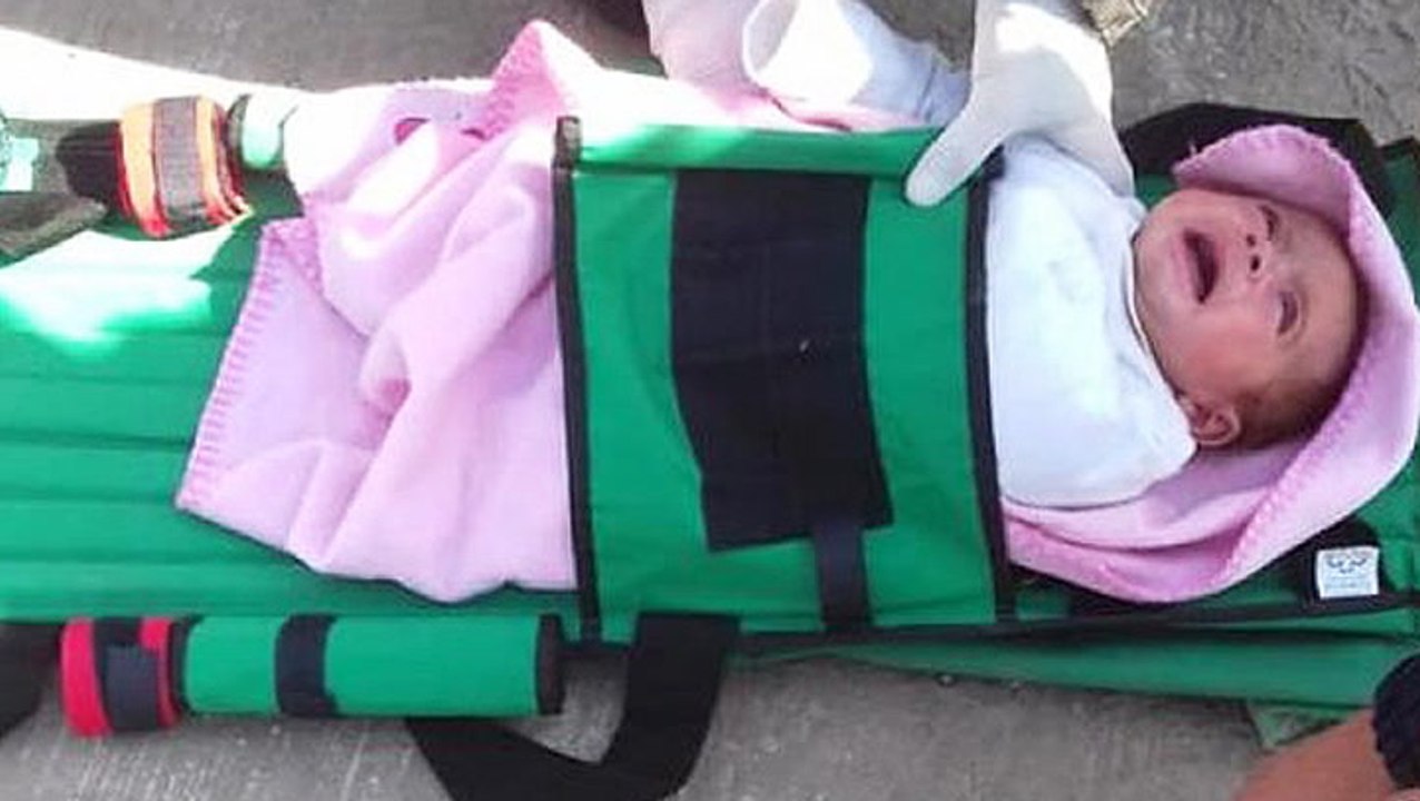 Infant Tumbles Into Storm Drain