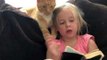 Girl Reads Her Own Version of the Bible to Her Very Patient Kitty