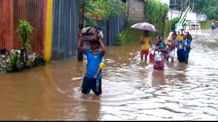People evacuated from rooftops after Kerala floods kill 164