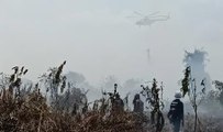 Water bombing begins as forest fire rages in Miri