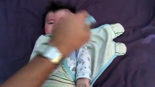Cute baby stretching after sleep