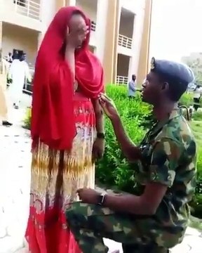 Best Proposal Video Ever!!! Nigerian Lady in tears after her soldier boyfriend proposed to her inside her university right in front of her Faculty of Law