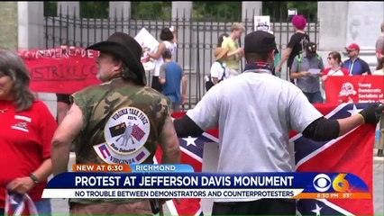 Скачать видео: Pro-Confederate Protesters Rally Against Commission`s Recommended Removal of Jefferson Davis Statue