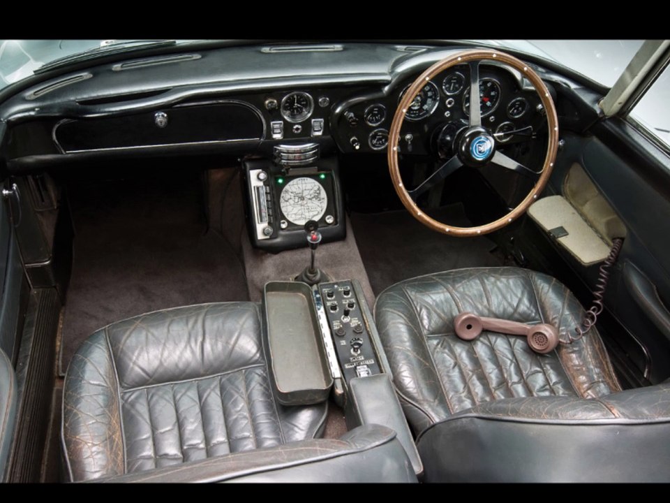 Aston Martin building 28 Goldfinger DB5 reproductions