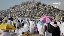 Muslim pilgrims scale Mount Arafat for peak of hajj