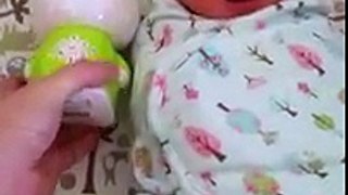 Calming a Crying Newborn Baby with a Bunny