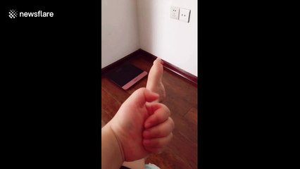 Woman moves hand and foot synchronously with music