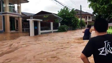 River busts banks in Thailand after downpour