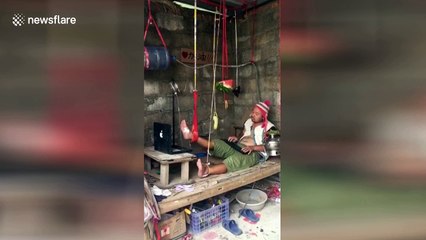 Addict gamer hangs food by bed to keep playing