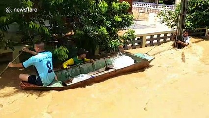 River busts banks in Thailand after downpour