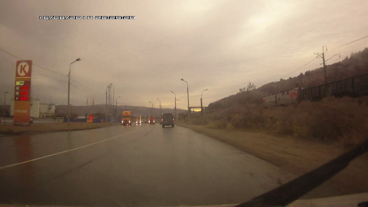 Light Pole Crashes Down on Car