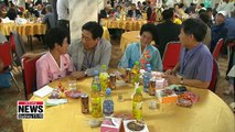 Separated families from the two Koreas share memories of the past during their group reunion