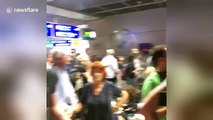 Passengers look uncertain as Frankfurt Airport terminal evacuated